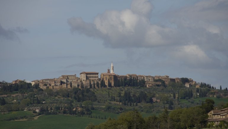 Beautiful Italian landscape in spring with blooming flowers and historic architecture, ideal travel season in Italy 2025