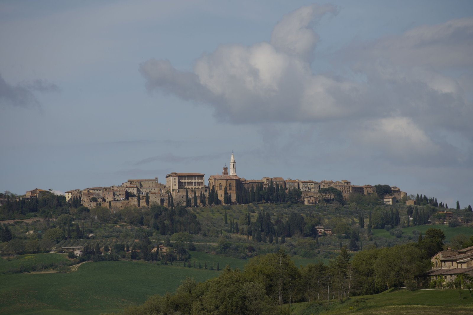Beautiful Italian landscape in spring with blooming flowers and historic architecture, ideal travel season in Italy 2025