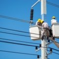 Traveling electrician working at a job site, demonstrating flexible electrical work across different locations in the US