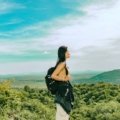 Lightweight minimalist travel backpack in nature representing simplicity and ease of travel