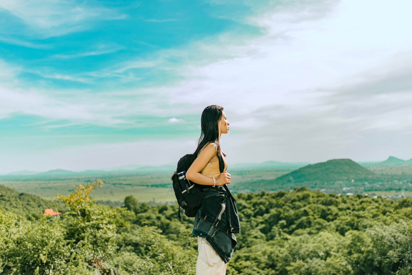 Lightweight minimalist travel backpack in nature representing simplicity and ease of travel