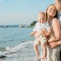 happy family traveling with toddler outdoors enjoying child-friendly activities and safe environment