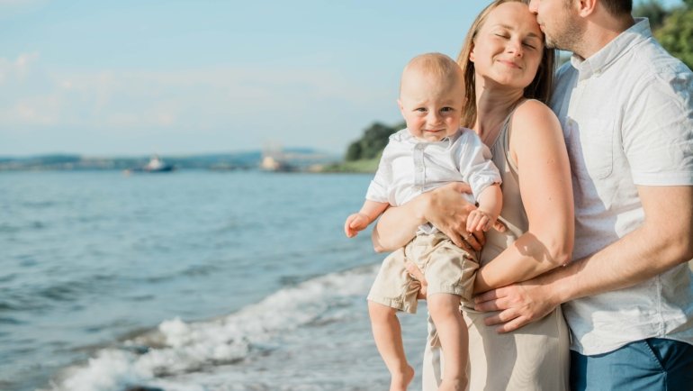happy family traveling with toddler outdoors enjoying child-friendly activities and safe environment