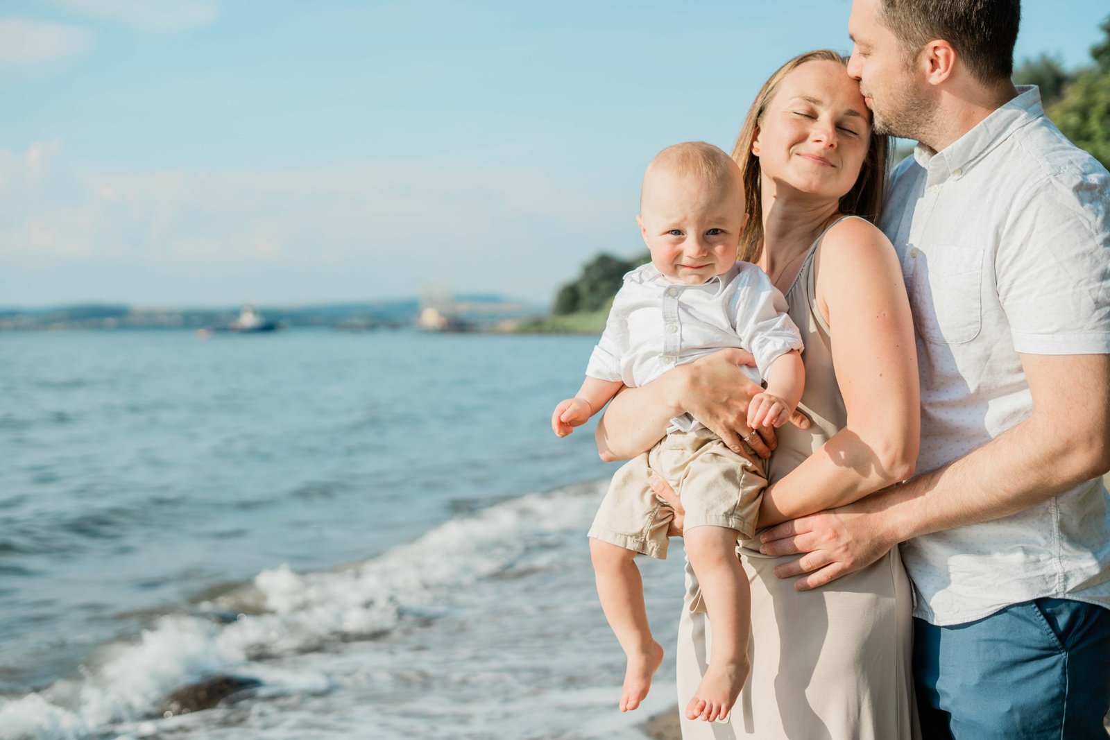 happy family traveling with toddler outdoors enjoying child-friendly activities and safe environment