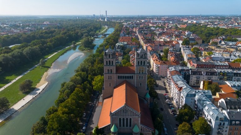 Vibrant German cityscape featuring historic buildings and modern urban life, highlighting cultural landmarks and lively streets