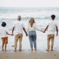happy family with teenagers exploring nature and culture on a travel adventure