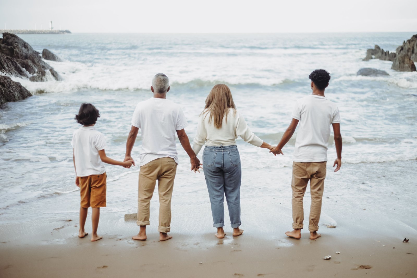 happy family with teenagers exploring nature and culture on a travel adventure