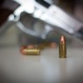 Close-up of a .22 caliber bullet traveling at high speed, illustrating precision and velocity in shooting sports