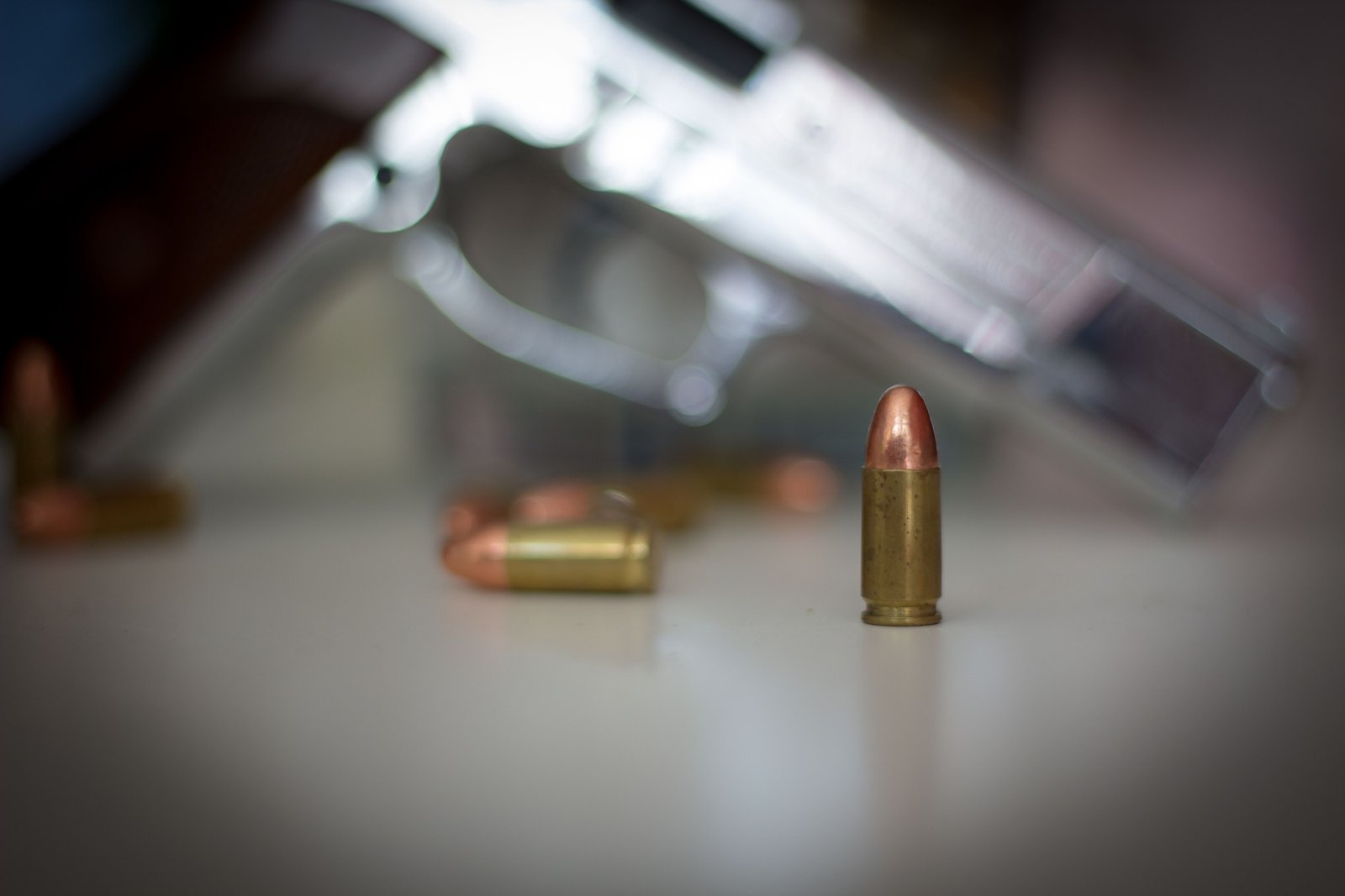 Close-up of a .22 caliber bullet traveling at high speed, illustrating precision and velocity in shooting sports