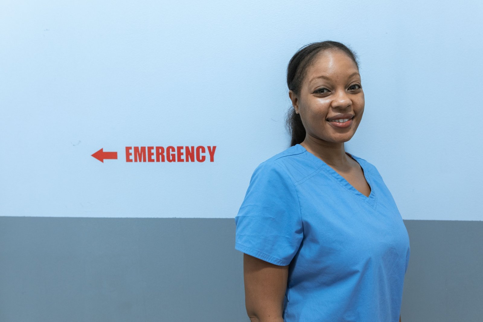 Emergency room nurse in Kansas City hospital providing care during busy shift for travel nursing assignment