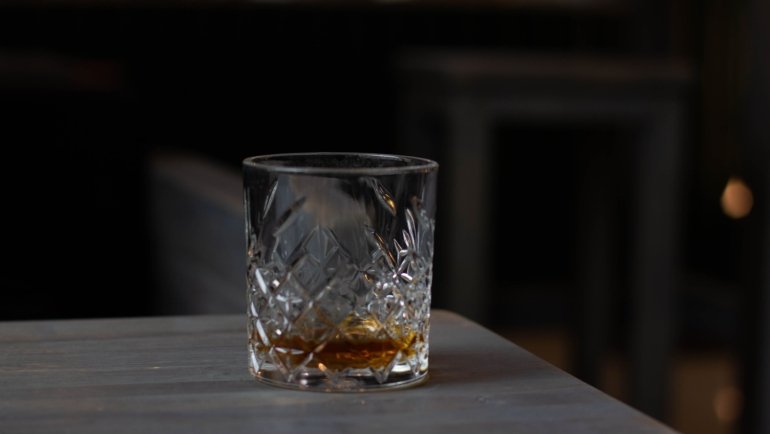 Glencairn whisky glass protected inside a compact travel case for safe and convenient transport