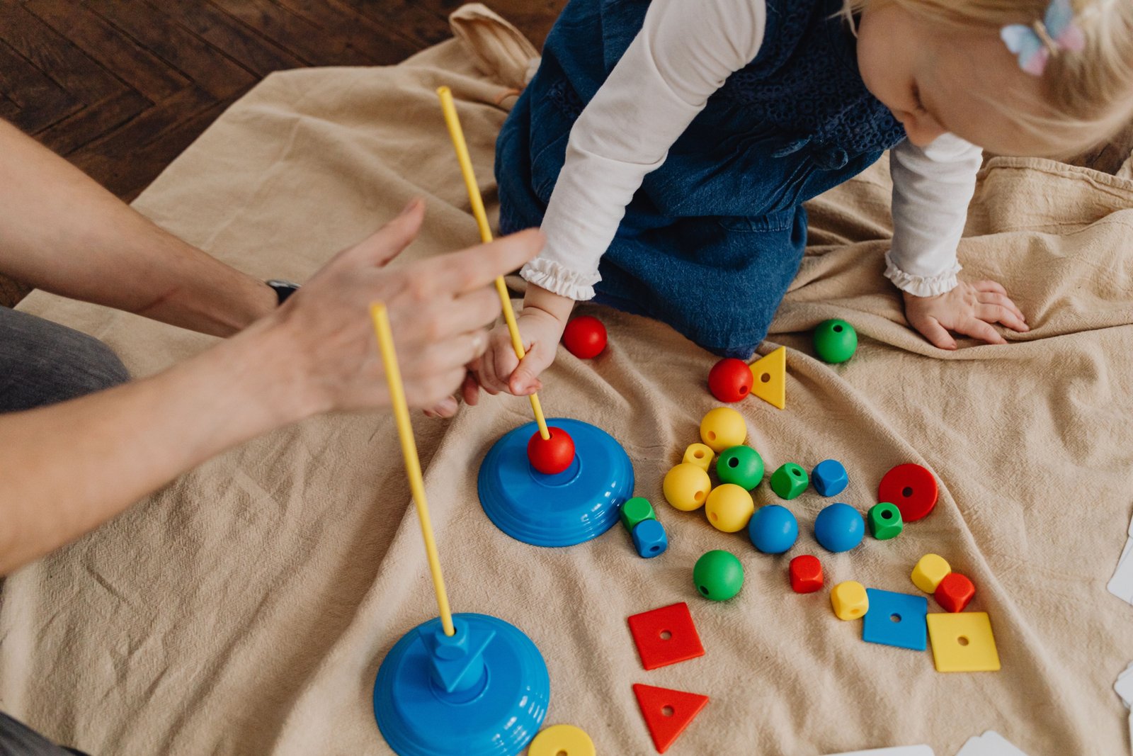 Happy children playing with travel toys during a family trip to stay entertained and engaged