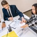 Corporate travel team planning business trip logistics and managing corporate travel efficiently