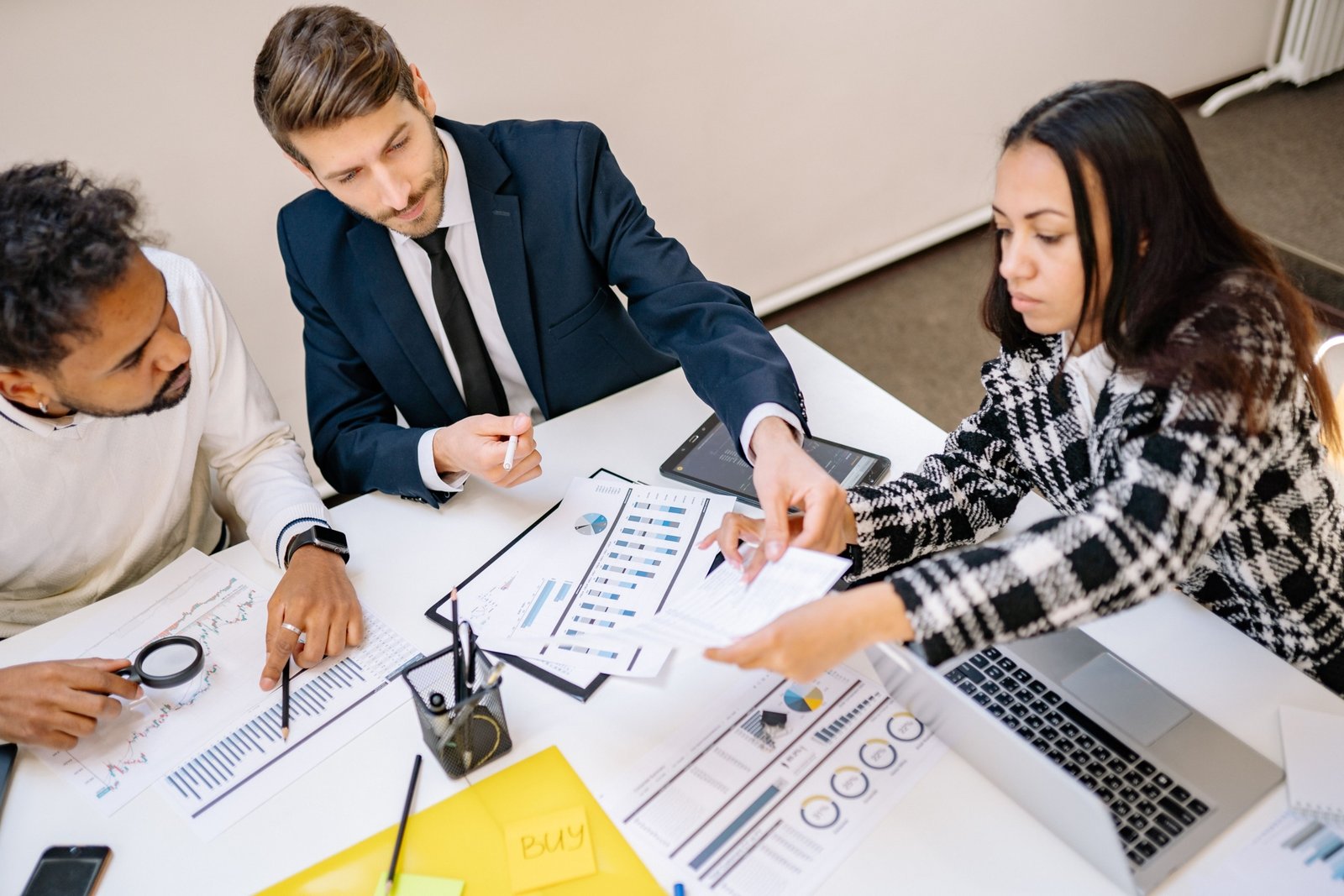 Corporate travel team planning business trip logistics and managing corporate travel efficiently