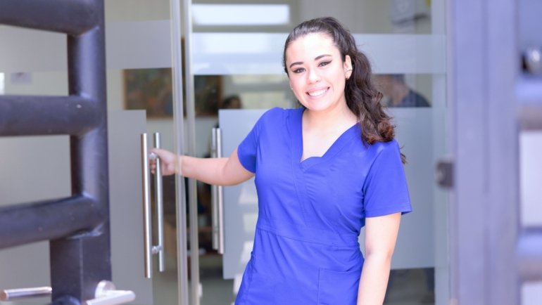 Licensed practical nurse preparing for travel nursing assignment with a confident and positive attitude