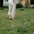 Traveler wearing breathable lightweight travel pants outdoors for comfort and mobility