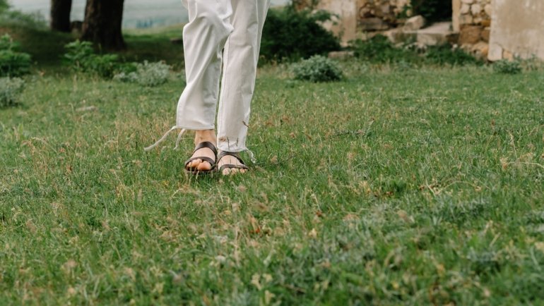 Traveler wearing breathable lightweight travel pants outdoors for comfort and mobility