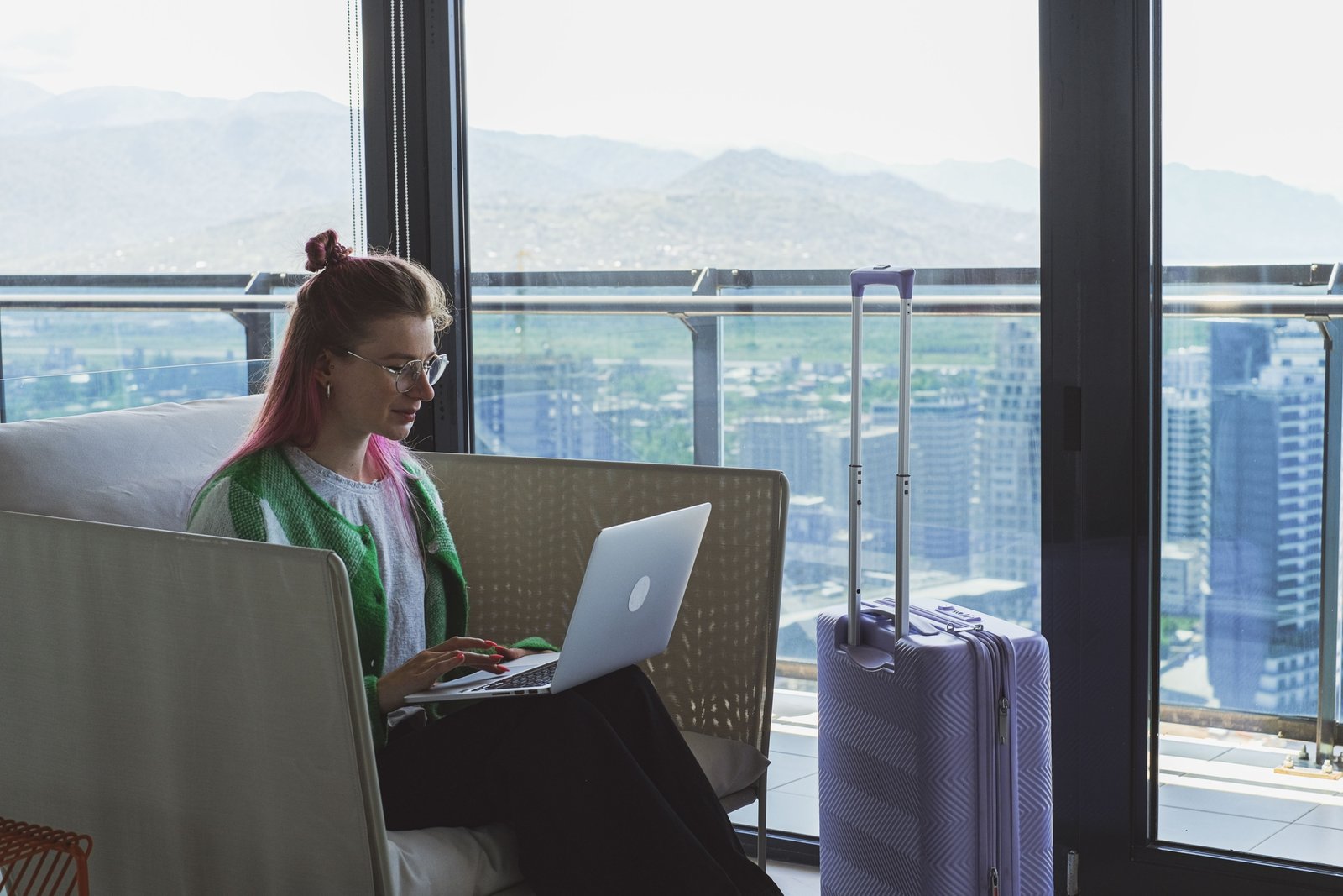 Board Certified Behavior Analyst working remotely while traveling, showcasing flexible travel BCBA job lifestyle