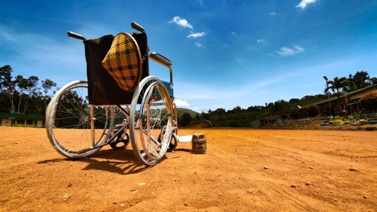 Lightweight foldable travel wheelchair used outdoors for easy mobility and comfort during travel