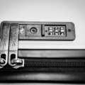 TSA-approved travel luggage lock securing suitcase zipper for safe and secure travel