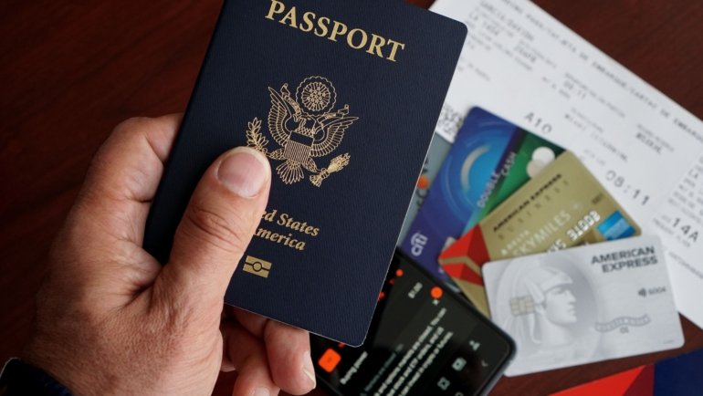 Travel document folder with passports, boarding passes, and tickets neatly organized for hassle-free travel