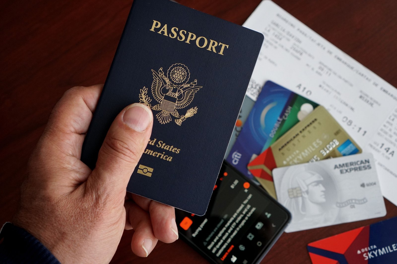 Travel document folder with passports, boarding passes, and tickets neatly organized for hassle-free travel