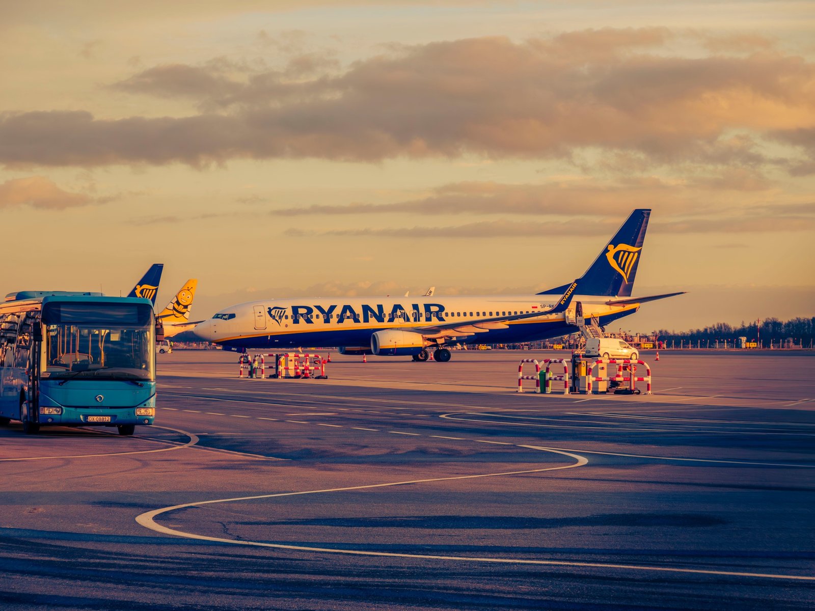 Secure airport parking lot with shuttle service transporting travelers to terminal