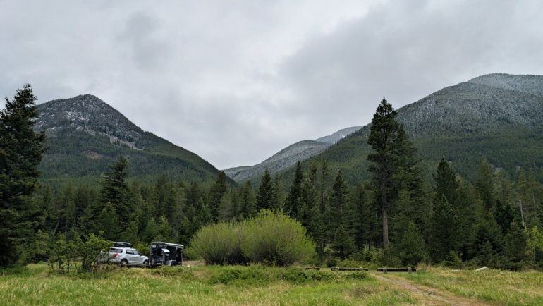 Artic Fox rugged travel trailer parked in scenic nature environment showing durability and comfort for outdoor adventures