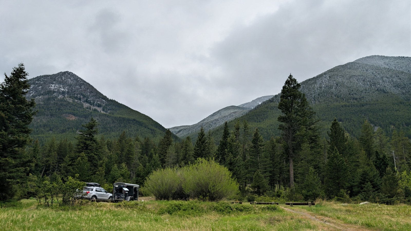 Artic Fox rugged travel trailer parked in scenic nature environment showing durability and comfort for outdoor adventures