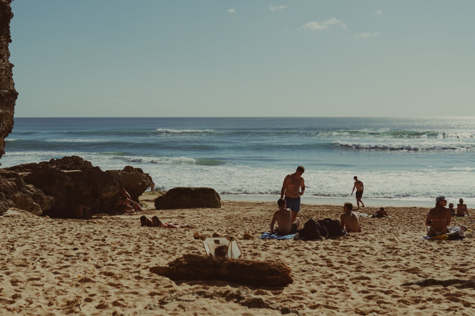 Sunny tropical beach in January with clear blue sky and gentle waves, ideal winter vacation destination