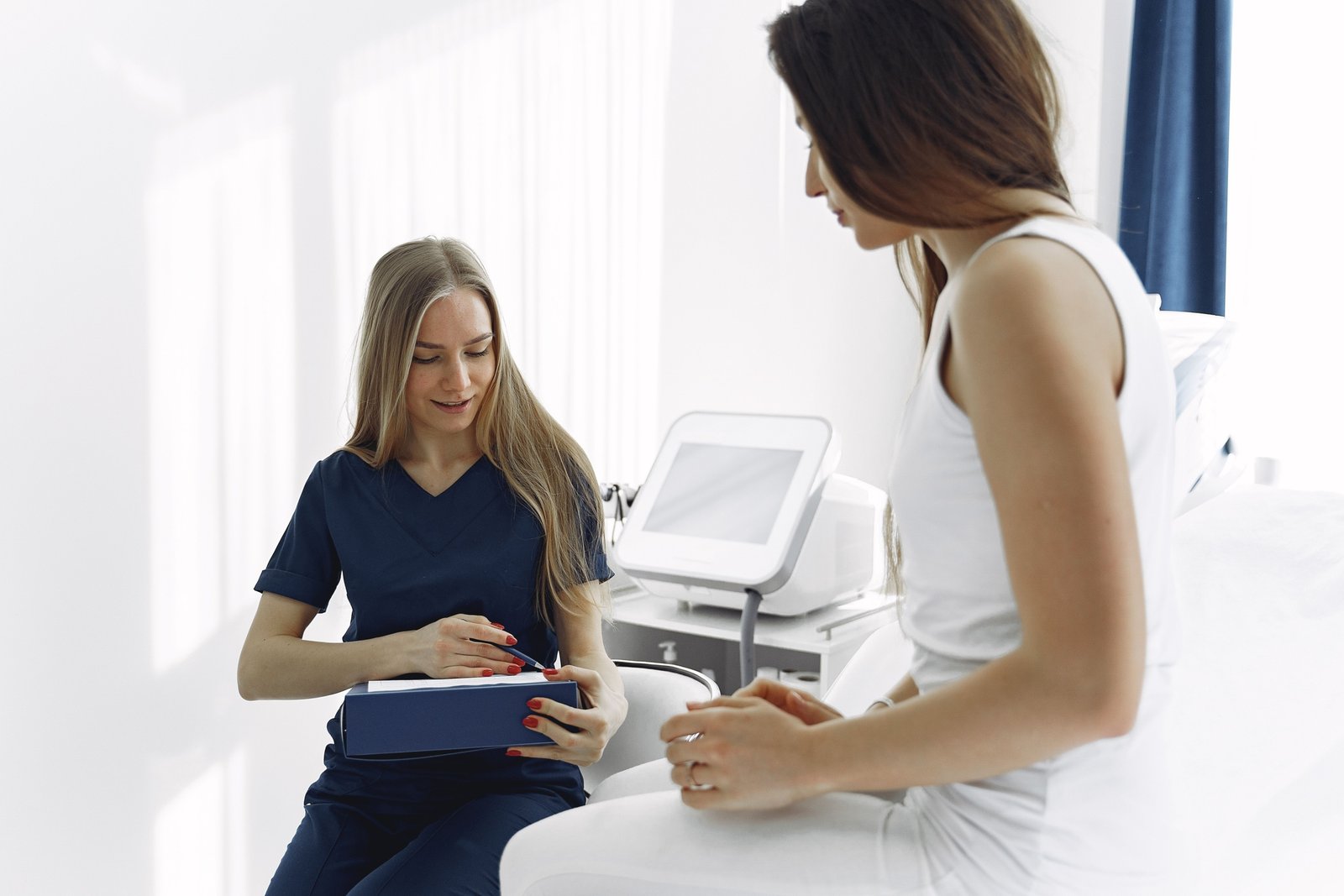 Travel licensed practical nurse providing care to a patient in a healthcare facility