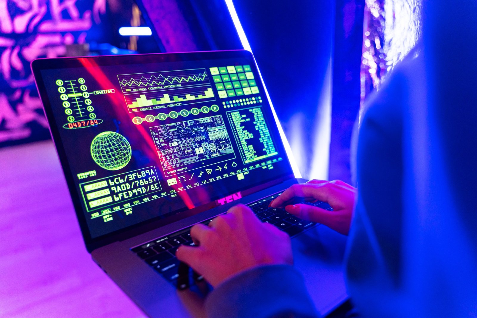 Traveler protecting personal data on laptop with secure cybersecurity measures at airport