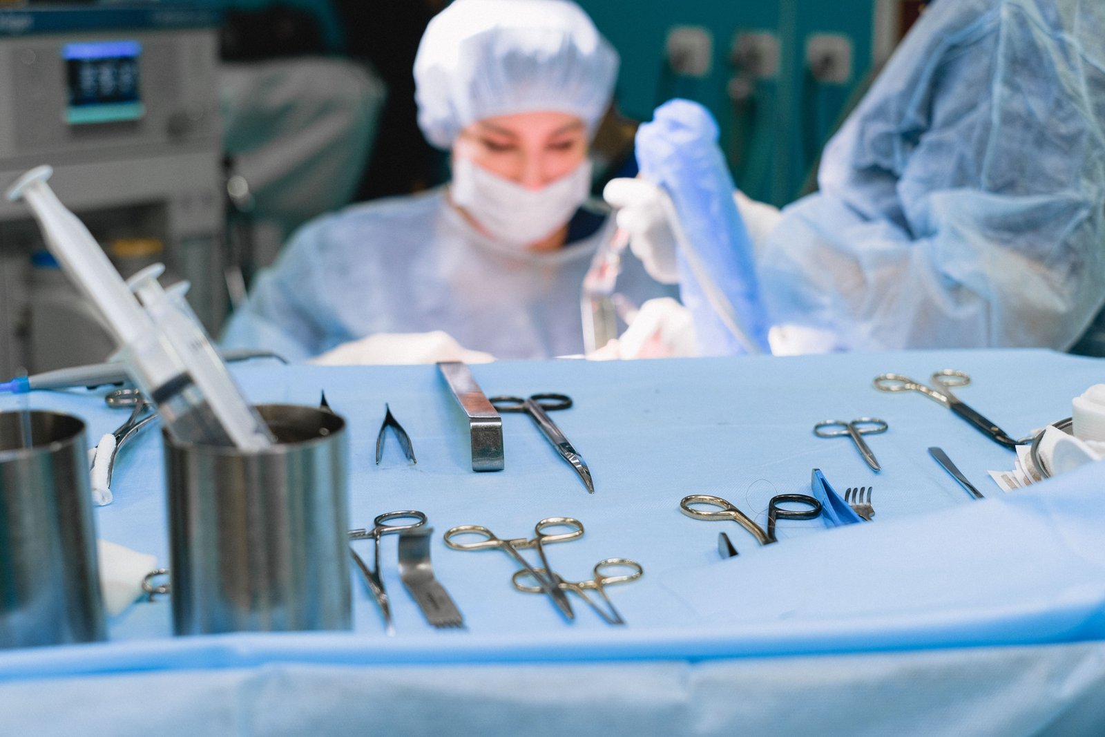 Travel surgical technologist preparing surgical instruments in an operating room for healthcare assignment