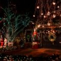 New York City street decorated with Christmas lights and festive holiday decorations at night